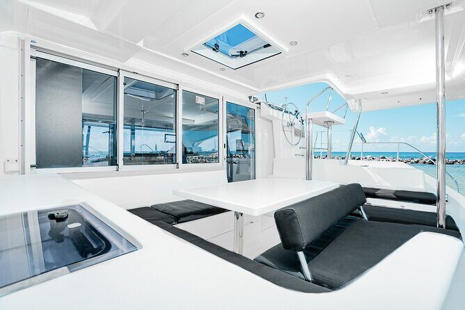8-Hour Private 40' Cat 2 Stop to Cozumel, Food, Drinks & Snorkel - Cruising Toward Cozumel and Trying Troll Fishing From the Yacht