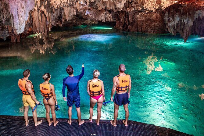 Akumal Cenote Swimming and Snorkeling from Cancun & Costa Mujeres - Stop 1: Akumal Cenote Swim With Stalactites and Stalagmites