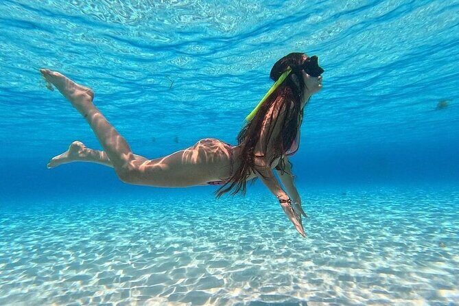 Catamaran in Cozumel with snorkeling at El Cielo and open Bar - Stop 1: Playa El Cielo snorkel (about 35 minutes of reef time)