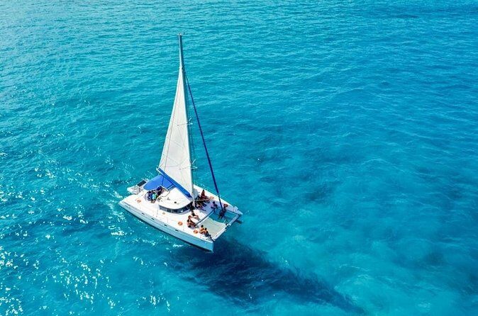 Catamaran Tour to Isla Mujeres Snorkeling with Buffet and Open Bar - Playa Norte snorkeling: what the 1-hour window is really for