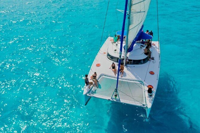 Catamaran Tour to Isla Mujeres Snorkeling with Buffet and Open Bar - Isla Mujeres free time: shopping, walking, and a real meal break