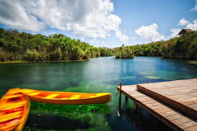 Cenote Tankah and Mayan Village Tour with Zipline, Canoes & Lunch - Tankah Cenote Swim: Crystal Water and Easy Wonder