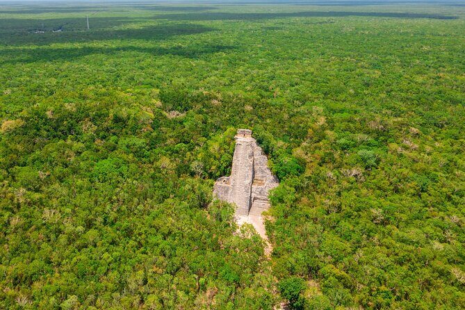 Cobá Ruins Mayan Village and Cenote Tour from Riviera Maya - Stop 1 at Zona Arqueologica de Coba: the 42 m pyramid and jungle ruins