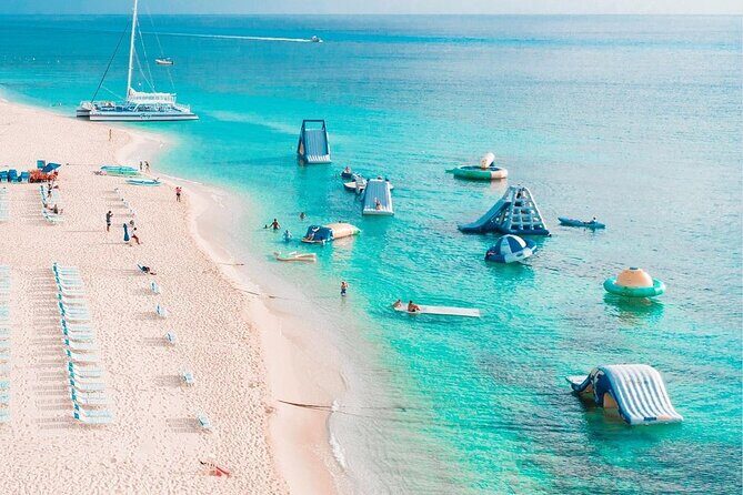 Cozumel Catamaran Fun: Snorkeling, Open Bar & Water Park - Stop 1: ferry transfer and what it actually means