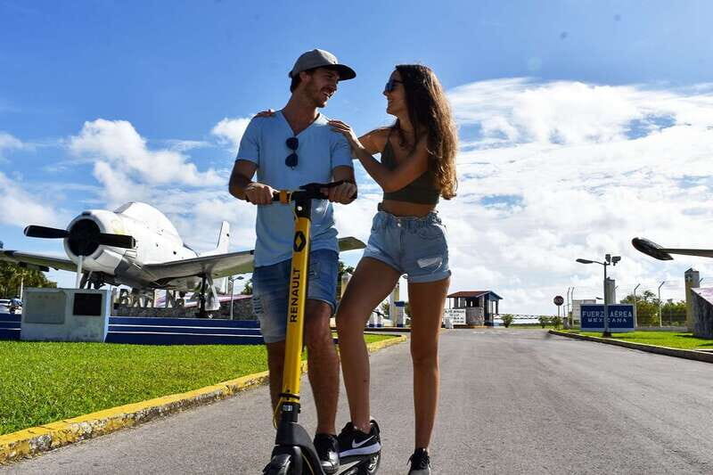 Cozumel: Clear Boat and Electric Scooter Ride - Scooters to Cozumel’s military air base: photos and the WWII plane story