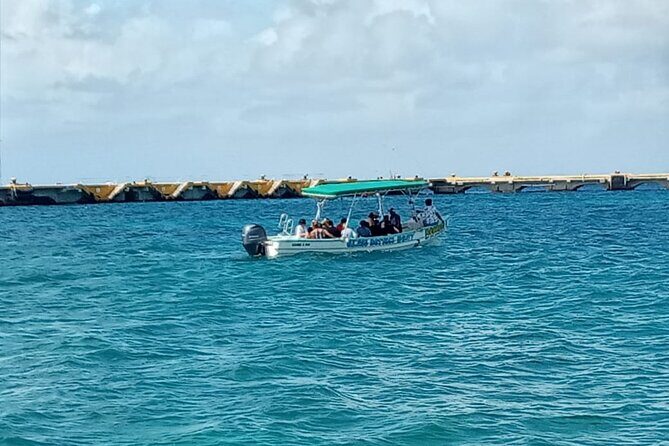Cozumel El Cielo Tour by Boat from Playa del Carmen & Transfer - Food and drinks on the water and at the beach club
