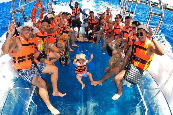 Crystal Boat Tour with Snorkeling and Drinks in Cozumel - Stop 1 in Cozumel: what you’ll likely spot (and what to focus on)