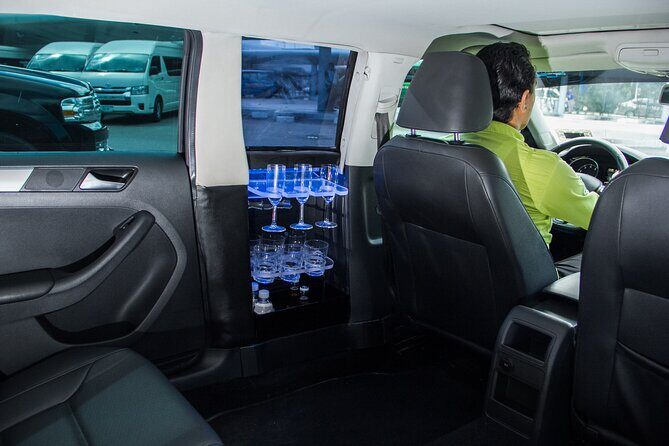 Departure by Luxury Sedan From Playa del Carmen to Cancun Airport - Pricing and value: $134 per group, up to 2 people