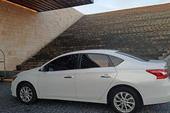 Economy Private Transfer from Tulum to Cancun Airport – Safe - Arriving at Cancún Airport: terminal drops that save you walking