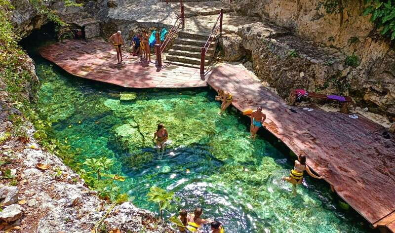 From Cancun: Day Trip to Tulum, Cenote & Playa del Carmen - Playa del Carmen on Quinta Avenida: shopping energy with a reality check
