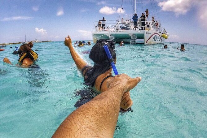 Full-Day Catamaran Cozumel Tour with Sky Snorkeling - Catamaran tour day: Drinks on board, then snorkeling when conditions are set