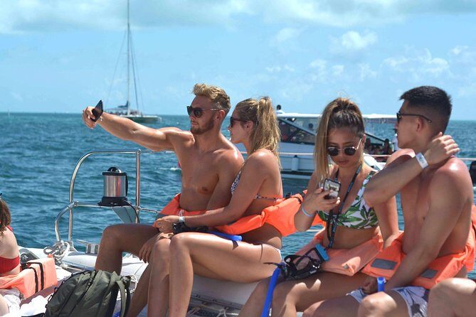 Isla Mujeres All Inclusive Sailboat Experience - Getting to the boat: pickup timing by area (and how not to miss it)