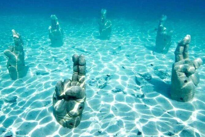 Isla Mujeres on luxury catamaran with snorkel, open bar and lunch - Stop 2: Isla Mujeres free time for beaches, streets, and souvenirs