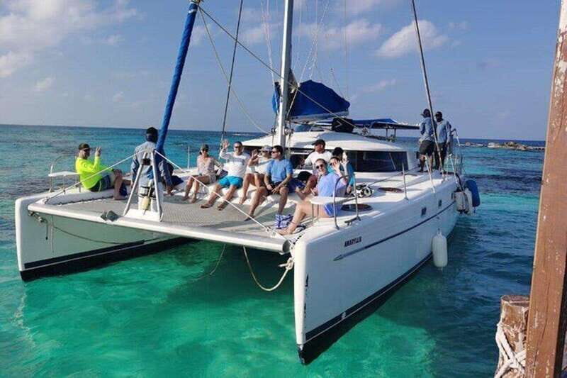 Isla Mujeres Plus Experience Catamaran Tour + Snorkel+Lunch - Snorkeling at El Meco reef: gear included, time set, expectations clear
