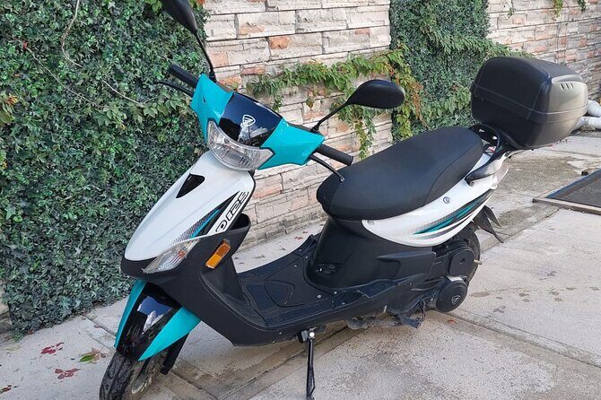 Italika D125 Private Scooter Rental in Tulum - The OZ Adventures meeting point vs. hotel delivery