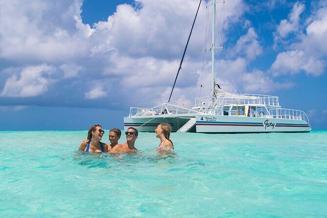 Luxury Cozumel Catamaran: Snorkel, Beach Club & Relaxation - Onboard the 65-foot catamaran: the “relax first” vibe