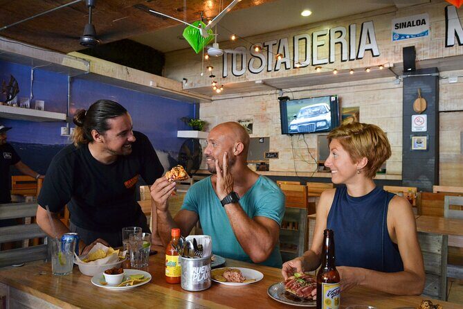 Mexican Beer & Seafood Madness in Playa del Carmen - What the guide adds: street art, history, and how the places work