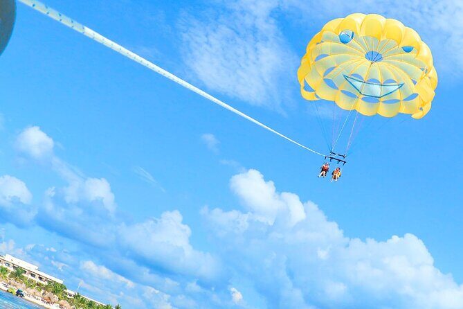 Parasailing & Beach Club with Transportation In Riviera Maya - What to Expect from the Guides and Crew