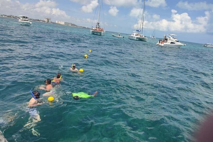 PDC: Isla Mujeres Catamaran Tour with Snorkeling - On board the catamaran: buffet lunch, open bar, and Tequila Party
