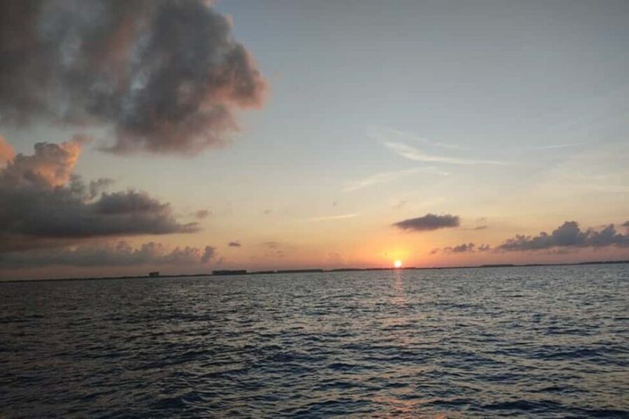 PDC: Isla Mujeres Catamaran Tour with Snorkeling - Getting there: Cancun-area pickup and the Playacar extra fee