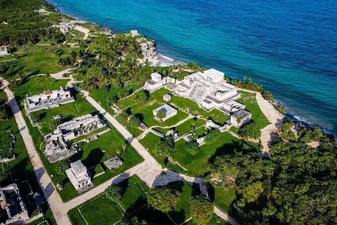 Private Tour Tulum And Coba Ruins Cenote Cavern Mayan Village - Tulum Archaeological Site: Ocean Views and Guide-Led Context