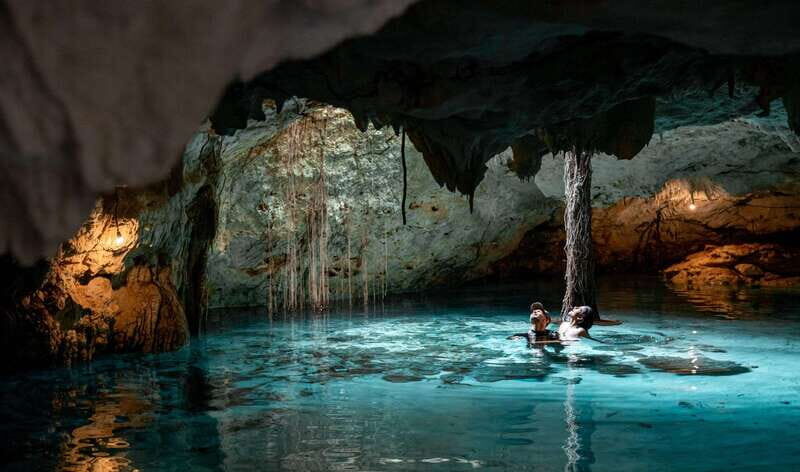 Riviera Maya: Tulum Ruins and 2 Cenotes Half-Day Tour - Tulum Ruins: guided walk, Temple of the Frescoes, and the God of the Wind