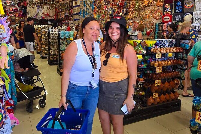 Tour in the Village Shopping and Beach Time in Cozumel - Plaza Central: church, clock, and those Cozumel letters