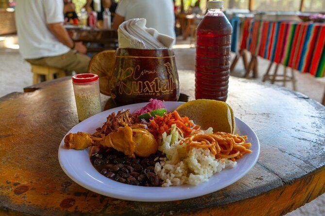 TULUM 4x1: Archaeological Zone, COBA, Cenote, 5th Avenue and lunch. - Entering Tulum ruins: a coastal Mayan site with built-in perspective