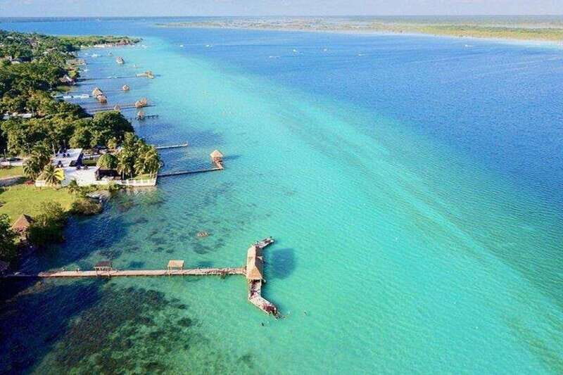 Tulum: Bacalar Lagoon and Cenote Adventure Day Trip - Laguna Bacalar boat ride: 7 Colors Lagoon and shifting views