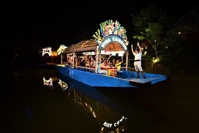 Xoximilco Night Cruise With Round Transportation from Tulum City - Music on the water: mariachi-style singing, games, and boat-to-boat moments